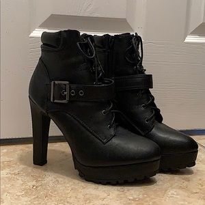 Fabulous heeled black lace up boots by JustFab
